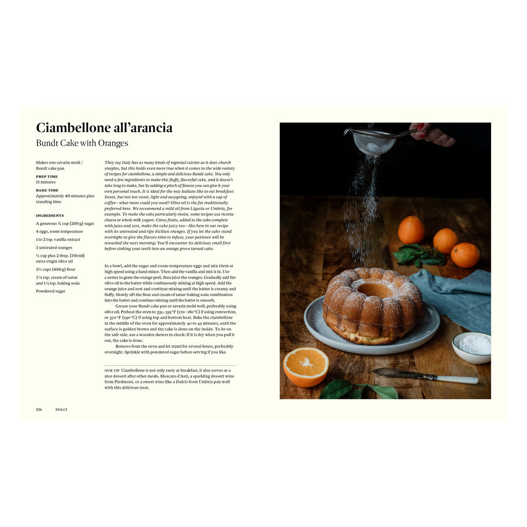 Rezeptseite aus dem Kochbuch Originale: Kranzkuchen mit Orangen, traditioneller italienischer Ciambellone mit Olivenöl, frisch gepresstem Orangensaft und Puderzucker, serviert rustikal auf Holztisch.