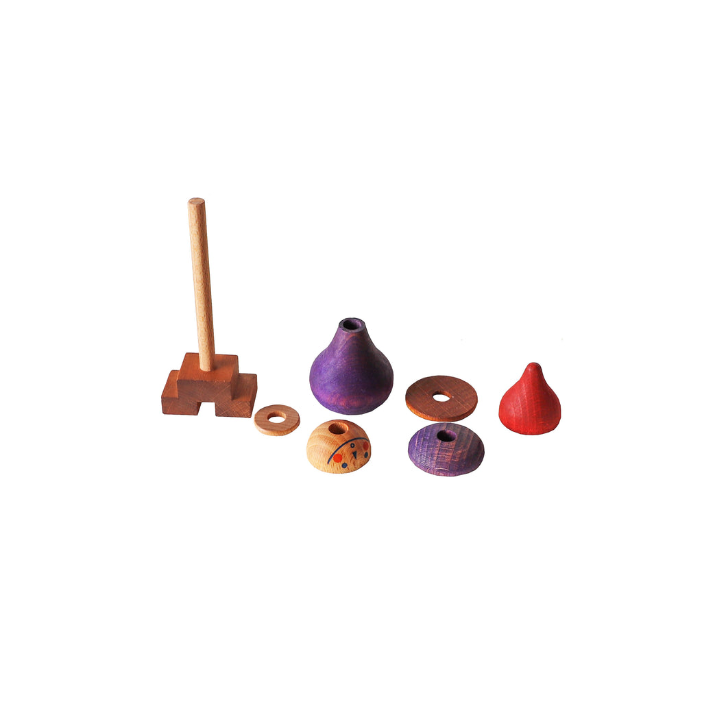 Einzelne Holzelemente der Steckfigur Lila von Wooden Story aus FSC zertifiziertem Holz, Montessori Steckspielzeug