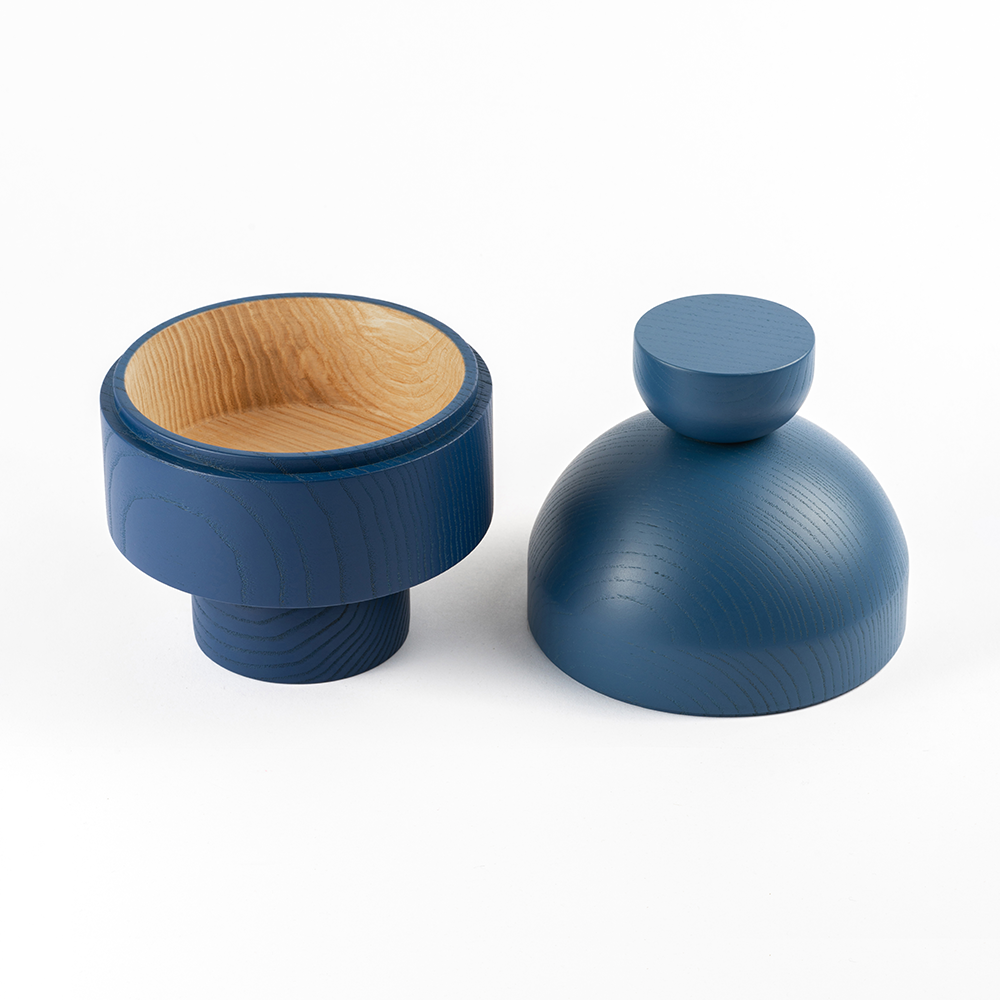 Design object ANUKI open in blue by NIEVEN. Hand-turned ash wood bowl two-piece silk matte finish modern storage for jewelry or accessories made in Germany.