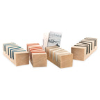 Design object BRIXXS CUTS by e+m made of ash wood. Modern card and note holder with colorful cuts ideal for desk and home office combining functionality and craftsmanship.