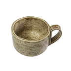 Handcrafted ceramic mug Caliente by Üm Studio in warm beige with fine brown speckles. Large stoneware mug with ergonomic handle lovingly made in Málaga Spain. Perfect for tea cappuccino or mindful morning rituals.